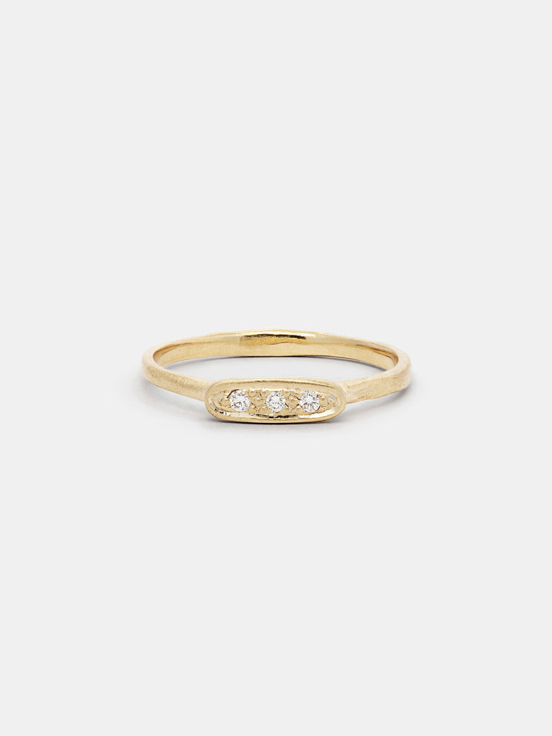 Shown: BIZARRE O - $400. Hana Ring in white Diamond. 14k yellow gold. Organic texture. Matte finish. Size 6.