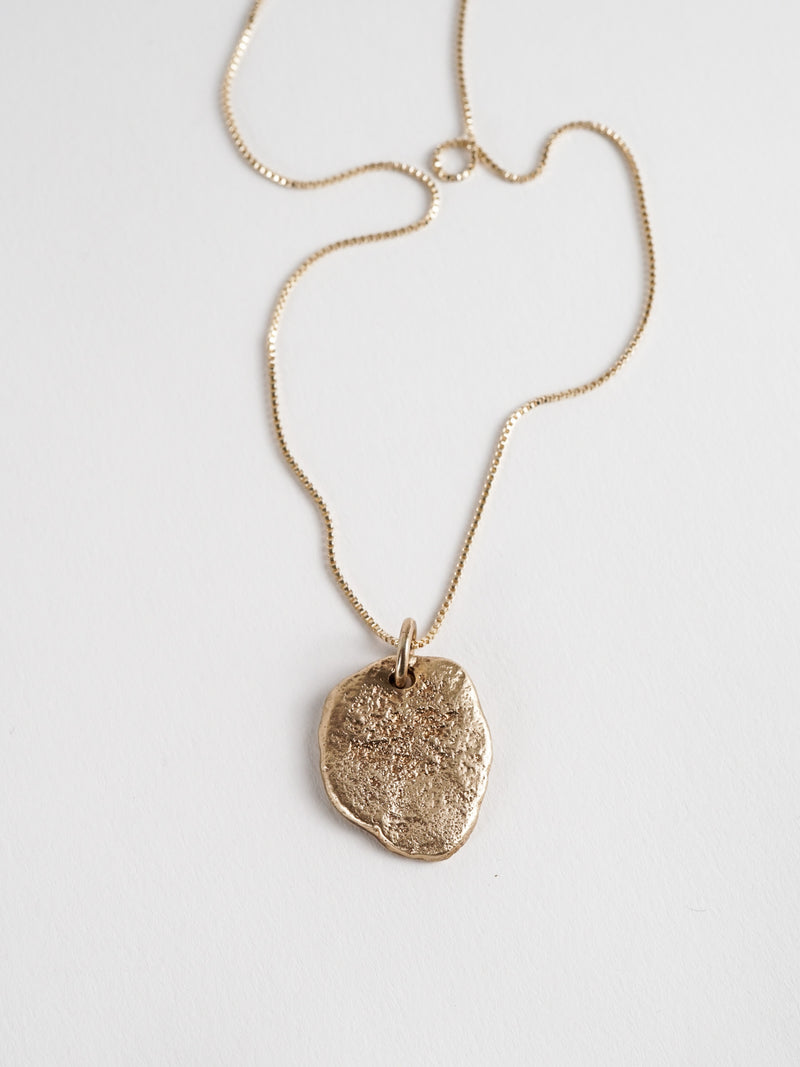 Shown: BIZARRE J - $1200 - Coin Necklace with 1.2mm Fairmined gold chain in 20" length. A solid 14grams of gold. Super weird and cool - a touch heavy. (Box chain is not included- see previous image for chain type.)