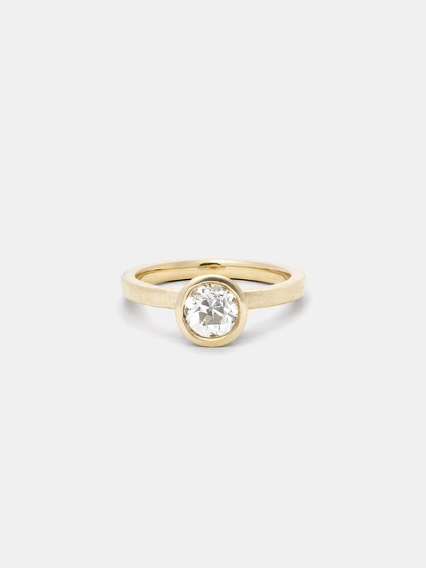 Shown: 0.75ct faint color antique diamond in 14k yellow gold with organic texture and signature matte finish.