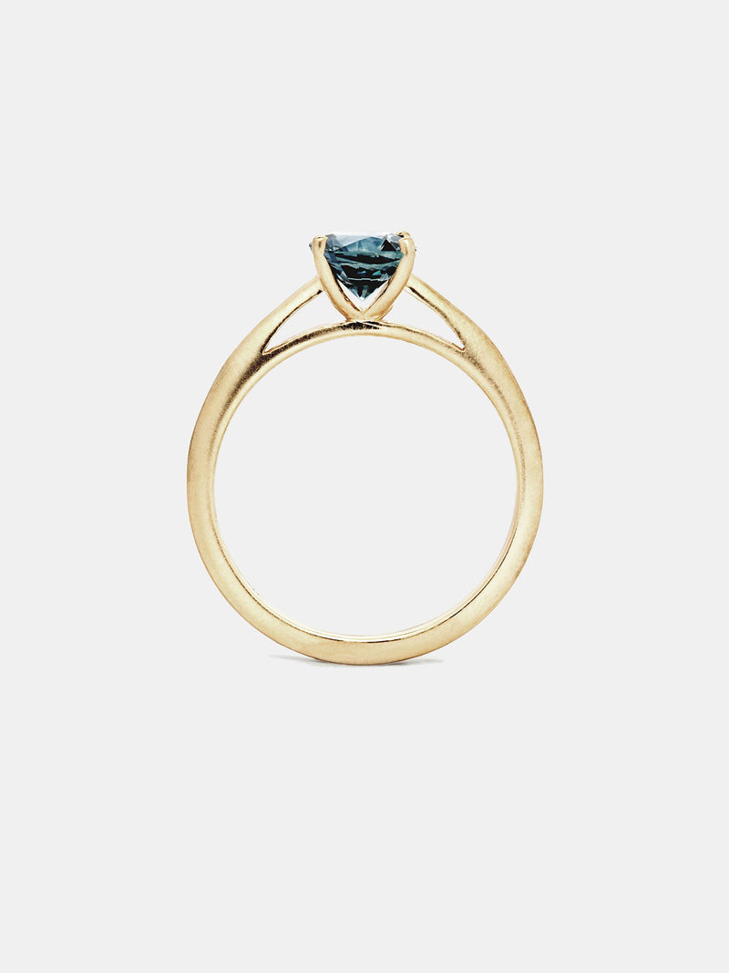Gardenia Solitaire- Sapphire with 1ct teal Montana sapphire in 14k yellow gold with smooth texture and signature matte finish.