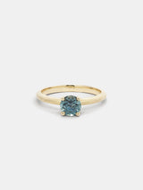 Shown: 0.75ct teal Montana sapphire in 14k yellow gold with organic texture and signature matte finish.
