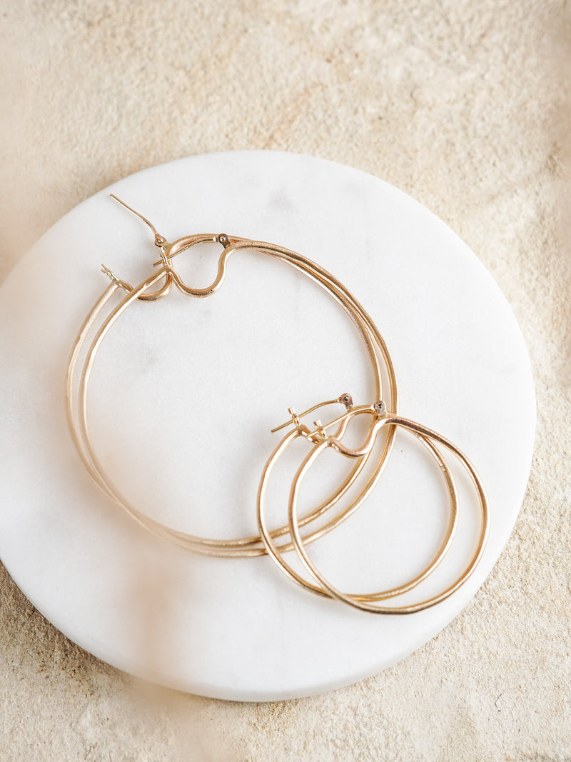 Shown: comparing the large Orb Hoops to the small version.