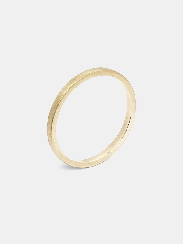 Pipecut Band- 1.5mm in 14k yellow gold with smooth texture and signature matte finish.