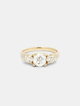 Shown: 1ct near colorless antique center stone with 0.3ct near colorless antique side stones in 14k yellow gold with organic texture and signature matte finish.