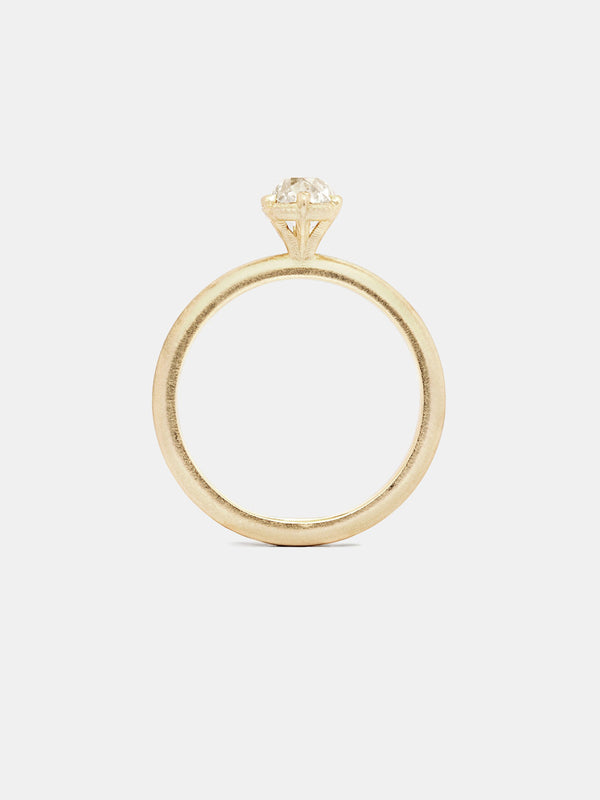 Valeria Solitaire with 0.5ct faint color antique old mine cut diamond in 14k yellow gold with smooth texture and signature matte finish.