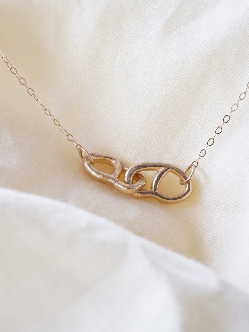 Shown: BIZARRE K - $300 - Double Link Necklace on 16" cable chain. 14k yellow gold. Pretty cute.