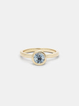 Shown: 1ct aqua Montana sapphire in 14k yellow gold with organic texture and signature matte finish.