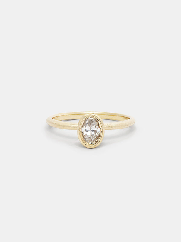 Shown: 0.5ct faint color recycled diamond in 14k yellow gold with organic texture and signature matte finish.
